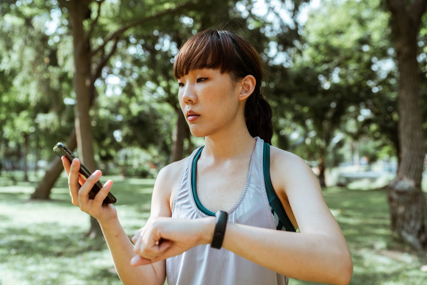 A person checking their smartwatch sleep stats